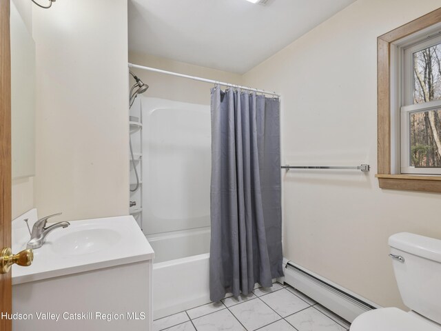 full bathroom featuring vanity, toilet, shower / tub combo, and a baseboard heating unit