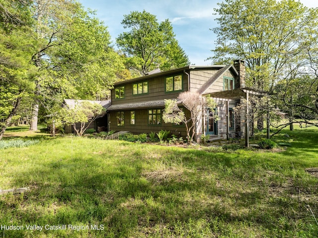 11 Louie Way, Woodstock, NY 12498 - back of property with a chimney