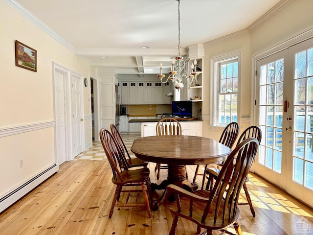 524 County Route 17, North Chatham, NY 12132 - dining room with a baseboard heating unit, french doors, plenty of natural light, light wood-style flooring, and ornamental molding