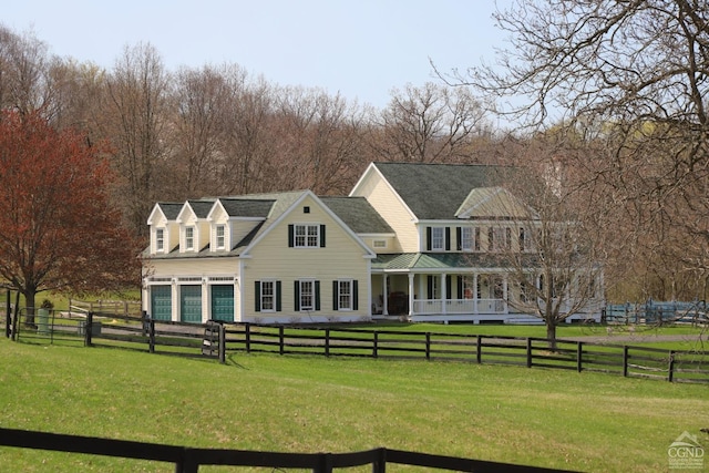 524 County Route 17, North Chatham, NY 12132 - back of property with a porch and an attached garage