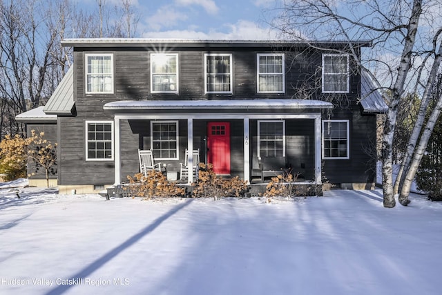 66 Maple Ave, Hunter, NY 12442 - view of front of home with covered porch and a metal roof