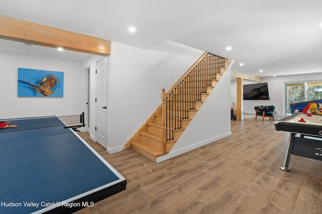 playroom with hardwood / wood-style floors