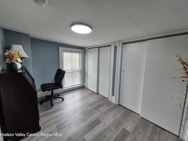 office area with wood finished floors