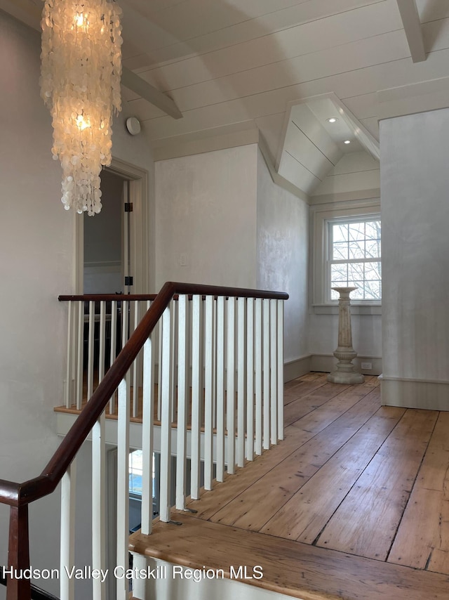 416 Hapeman Hill Rd, Red Hook, NY 12571 - stairs featuring a chandelier, wood-type flooring, baseboards, and a ceiling fan