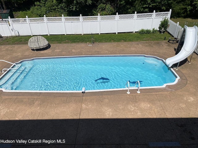 424 Joys Ln, Hurley, NY 12443 - view of pool featuring a water slide, a patio area, and view of scattered trees