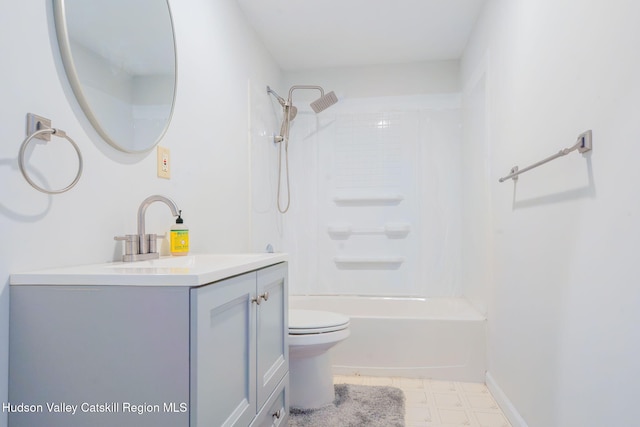 bathroom featuring shower / bathing tub combination, vanity, toilet, and baseboards