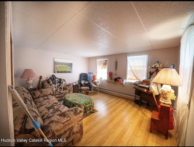 125 County Route 26a, Stuyvesant, NY 12106 - living room featuring baseboard heating and light wood finished floors