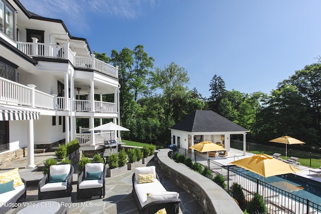 9 Chambers Rd, West Park, NY 12493 - view of home's community featuring a patio, fence, a pool, and an outdoor structure