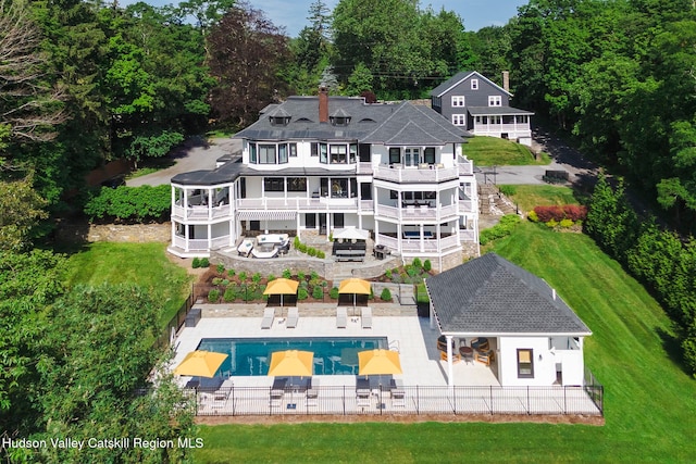 9 Chambers Rd, West Park, NY 12493 - rear view of house featuring an outdoor pool and a patio
