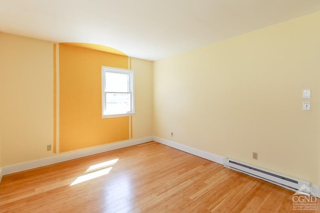 32 Harvey Mountain Rd, Austerlitz, NY 12017 - unfurnished room featuring baseboard heating, light wood-type flooring, and baseboards