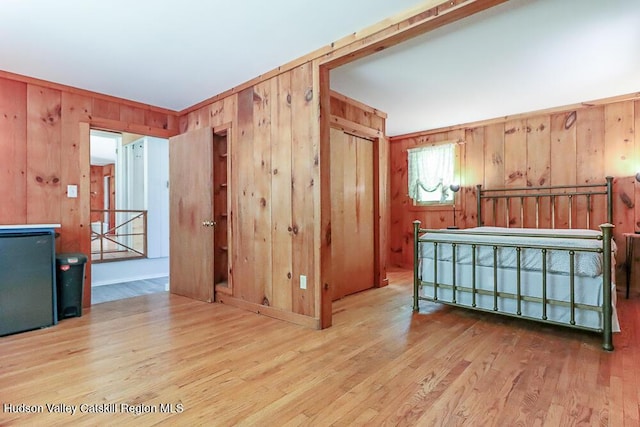 32 Harvey Mountain Rd, Austerlitz, NY 12017 - bedroom with wood walls and wood finished floors