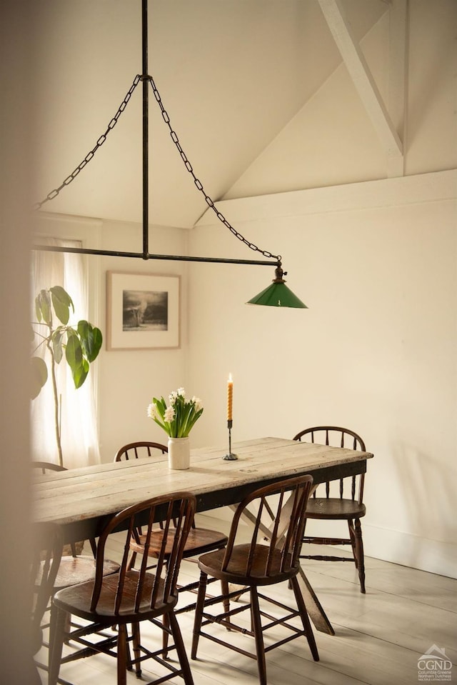 222 Main St, Germantown, NY 12526 - dining area with baseboards, lofted ceiling, and light wood finished floors