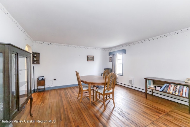 2236 Ny 385, Coxsackie, NY 12051 - dining area with hardwood / wood-style flooring, baseboards, and baseboard heating