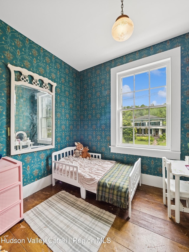 397 Main St, Franklin, NY 13775 - bedroom with hardwood / wood-style flooring, baseboards, and wallpapered walls