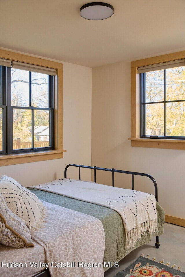 bedroom with baseboards