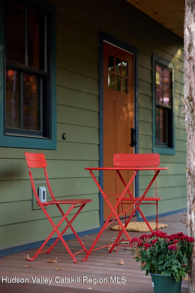 doorway to property featuring covered porch