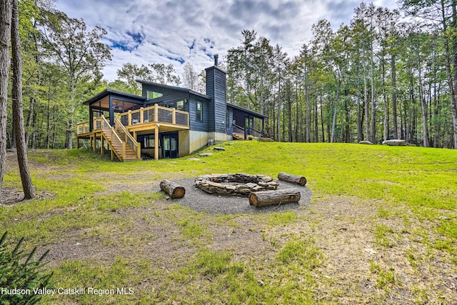 158 Rivka Rd, Saugerties, NY 12477 - view of yard featuring a fire pit, a wooden deck, and stairway