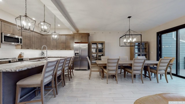 292 S St Unit 2, Windham, NY 12496 - dining space featuring a chandelier