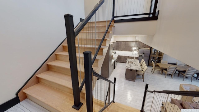 292 S St Unit 2, Windham, NY 12496 - stairway with wood finished floors and a towering ceiling