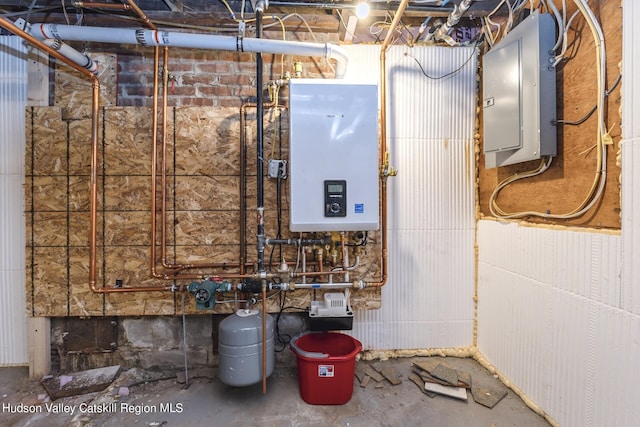 utility room with tankless water heater and electric panel