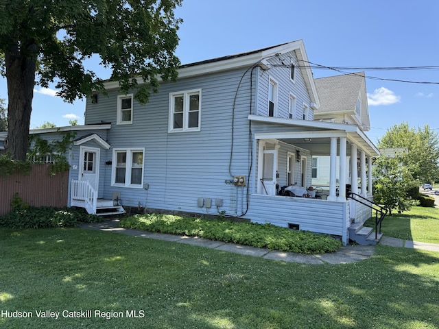 29 Railroad Ave, Chatham, NY 12037 - view of front of home featuring a front yard and covered porch