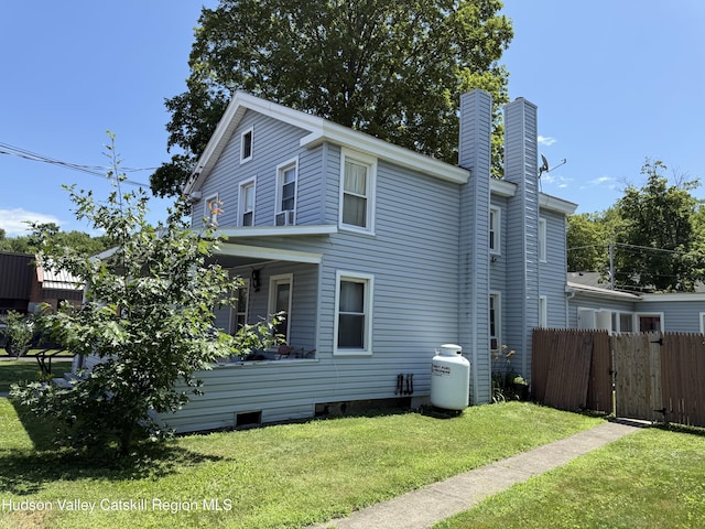 29 Railroad Ave, Chatham, NY 12037 - rear view of house featuring a chimney
