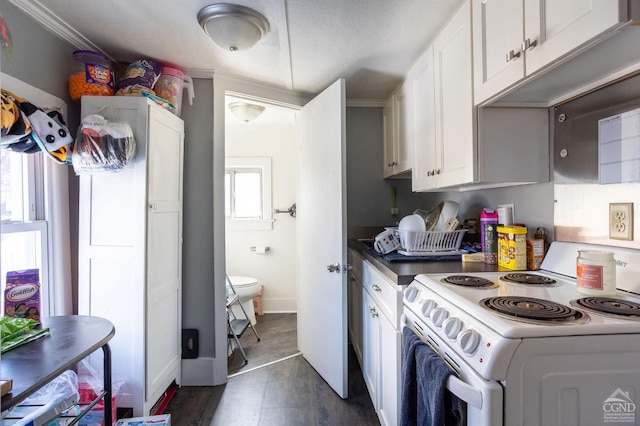 29 Railroad Ave, Chatham, NY 12037 - washroom with dark wood-style flooring and baseboards