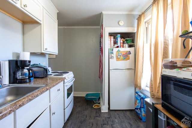 29 Railroad Ave, Chatham, NY 12037 - kitchen featuring white appliances, white cabinets, dark wood-type flooring, and crown molding