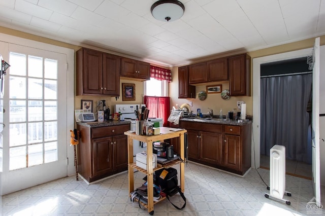 29 Railroad Ave, Chatham, NY 12037 - kitchen with light flooring and dark countertops