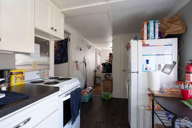 29 Railroad Ave, Chatham, NY 12037 - kitchen with white appliances, dark wood-style flooring, white cabinets, and dark countertops