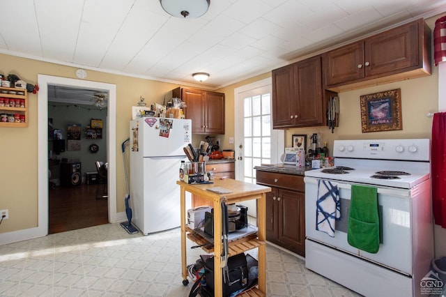 29 Railroad Ave, Chatham, NY 12037 - kitchen featuring white appliances, crown molding, and light floors
