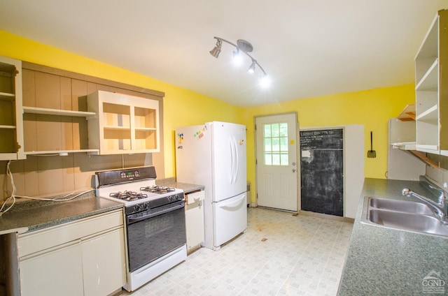 kitchen featuring open shelves, white appliances, a sink, white cabinets, and light floors