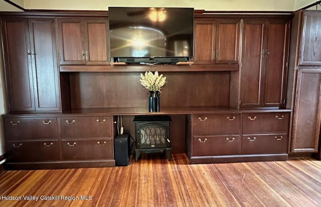 unfurnished office featuring light hardwood / wood-style floors