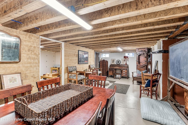 dining room featuring concrete flooring