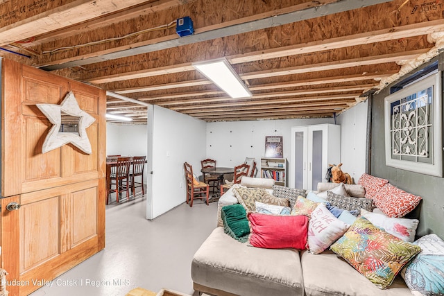 living room with concrete floors