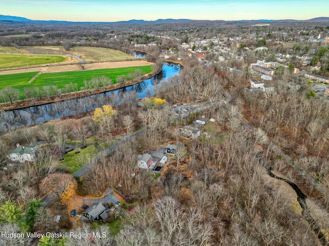 bird's eye view featuring a water and mountain view