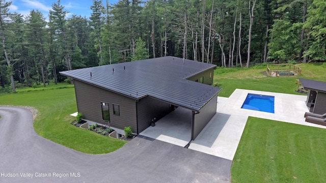 501 Birch St, Copake, NY 12516 - swimming pool featuring a lawn and a wooded view