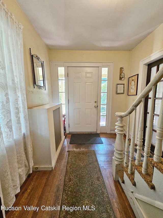 foyer featuring dark hardwood / wood-style flooring