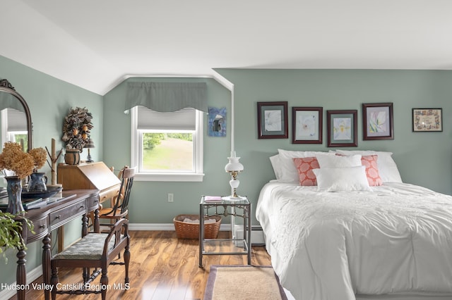 2727 County Route 8, Elizaville, NY 12523 - bedroom with lofted ceiling, wood finished floors, and baseboards