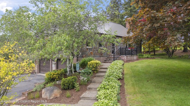 2727 County Route 8, Elizaville, NY 12523 - view of front of property with a front yard, stairway, a standing seam roof, metal roof, and a chimney