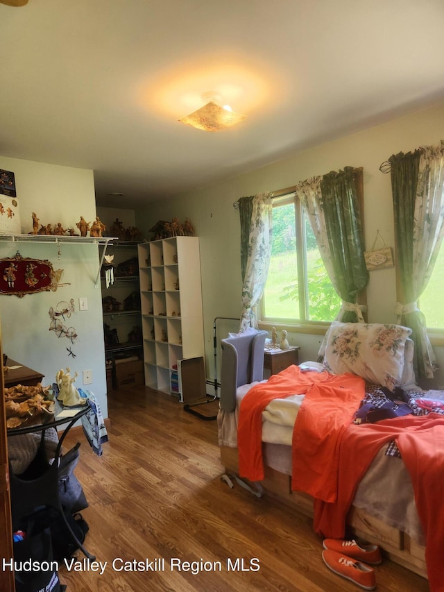 2773 Lucas Tpke, Accord, NY 12404 - bedroom featuring wood finished floors and a baseboard radiator