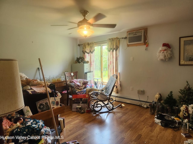 2773 Lucas Tpke, Accord, NY 12404 - bedroom featuring wood finished floors, a wall mounted AC, a baseboard heating unit, and ceiling fan