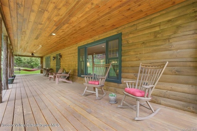 wooden terrace with a porch