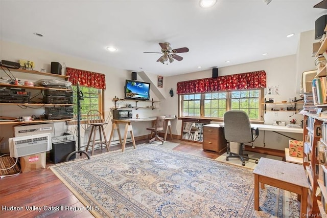 office area with hardwood / wood-style floors and ceiling fan