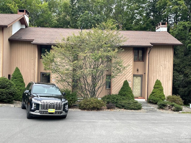 26 Townhouse Ln Unit 4A, Windham, NY 12496 - view of front of property with a chimney and a shingled roof