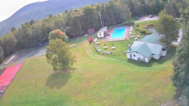26 Townhouse Ln Unit 4A, Windham, NY 12496 - view of subject property with a forest, a pool area, and mountains