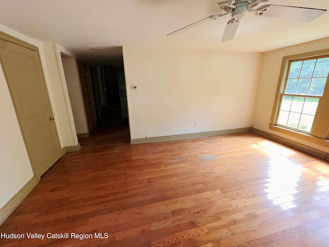 4098 US Highway 209, Stone Ridge, NY 12484 - spare room with light wood-type flooring, baseboards, and a ceiling fan