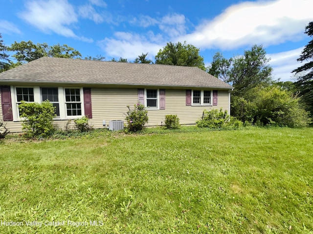 4098 US Highway 209, Stone Ridge, NY 12484 - view of property exterior with a yard, cooling unit, and a shingled roof