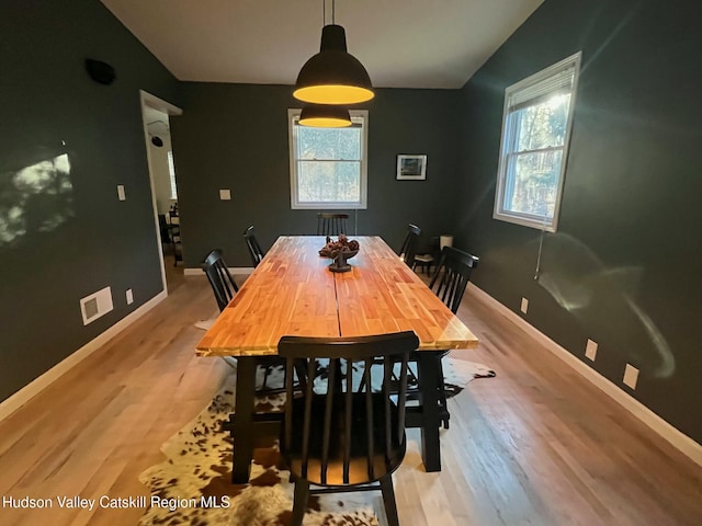 dining room featuring light hardwood / wood-style flooring