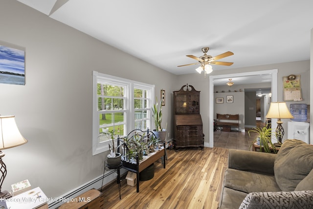 2410 Bruynswick Rd, Wallkill, NY 12589 - living room featuring ceiling fan, hardwood / wood-style flooring, and baseboards